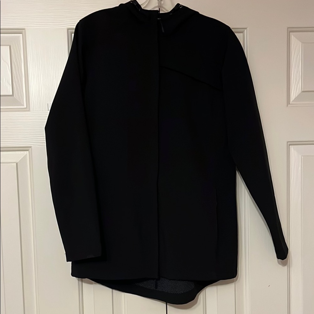 New Balance Black Outerwear with Silver Logo